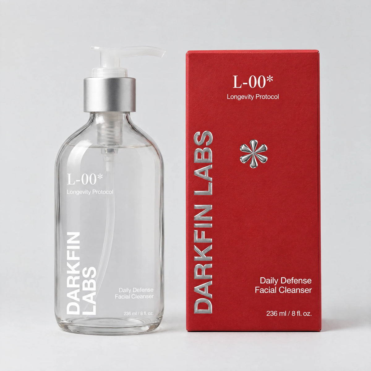 The bottle beside its red carton